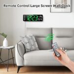 Remote-controlled LED wall clock in modern living room, showing time, temp, and date.