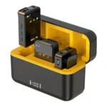 Wireless microphone system with yellow lined charging case and labeled compact units for TX, RX, and BT.